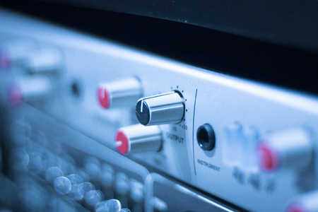 Professional sound recording audio studio digital equipment, amplifier, knobs and graphic equalizer controls.の写真素材