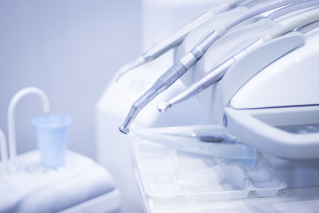 Dentists chair and drills in dental clinic office to treat patients with orthodontics.の写真素材