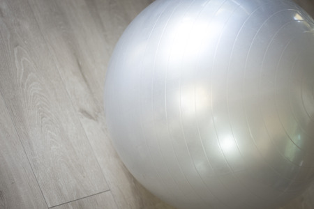 Gym exercise pilates ball in fitness studio.の写真素材
