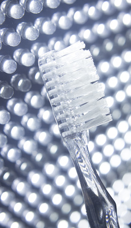 Tooth brush isolated in creative artistic photo.の写真素材
