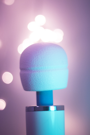 Sex toy female magic wand vibrator clitoral, vaginal and anal stimulation attachment for magic wand artistic color photo.の写真素材