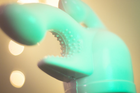 Sex toy female vibrator clitoral, vaginal and anal stimulation attachment for magic wand artistic color photo.の写真素材