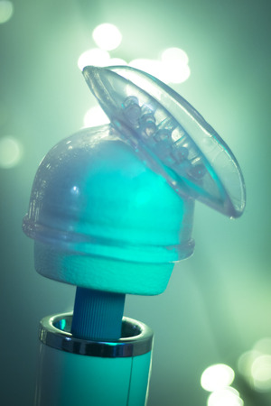 Sex toy female vibrator clitoral, vaginal and anal stimulation attachment for magic wand artistic color photo.の写真素材