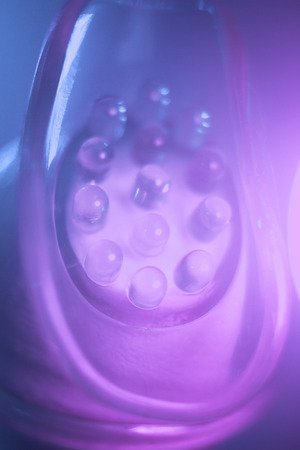 Sex toy female vibrator clitoral, vaginal and anal stimulation attachment for magic wand artistic color photo.の写真素材