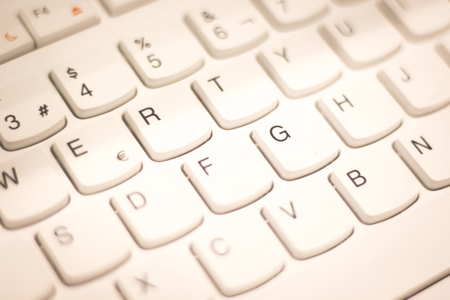 Personal computer pc external keyboad keys in Spanish format keypad isolated photo.