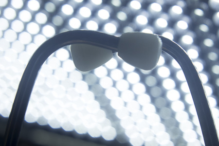 Medical doctor's stethoscope used to listen to patient heart rate, beats and monitor irregular heart beatsの写真素材