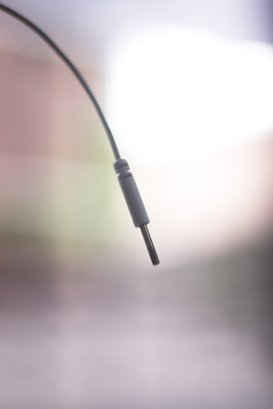 Physiotherapy equipment for physical therapy with electrical impulses via electrode and rehabilitation exercise.の写真素材