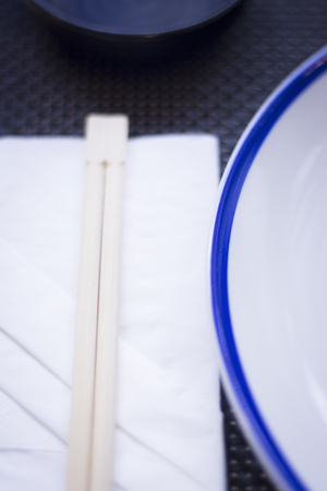 Asian chopsticks in Japanese restaurant to eat sushi and oriental cuisine.の写真素材