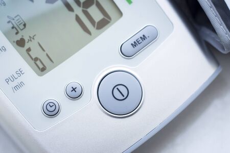 Portable hand held domestic cardiac blood pressure and irregular heart beat pulse rate meter to show...