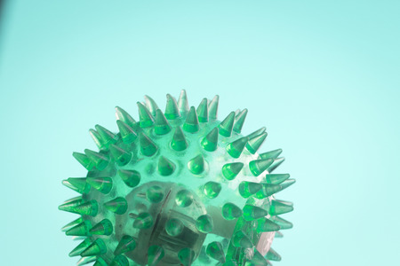 Spiky physiotherapy, fitness sports self massage ball used to roll out tired, sore muscles, tension, strains and to increase muscle flexibility.の写真素材