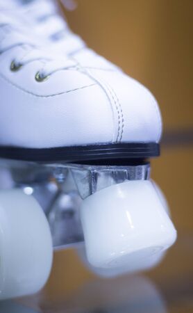 Quad figure skate rollerskates in skate store in shop window display. Skates with four wheels for...