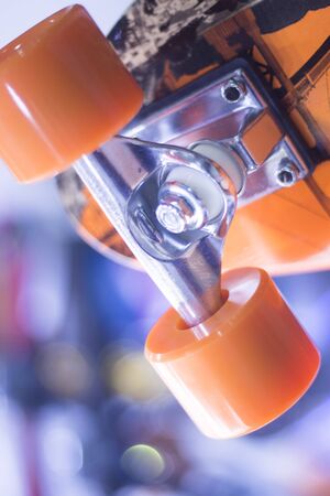 Skate board and wheels, axle and bearings in skates store on display in shop window on sale new and shiny.の写真素材