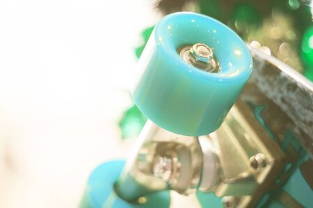 Skate board and wheels, axle and bearings in skates store on display in shop window on sale new and shiny.の写真素材