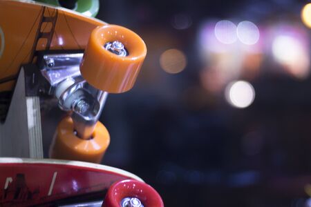 Skate board and wheels, axle and bearings in skates store on display in shop window on sale new and...