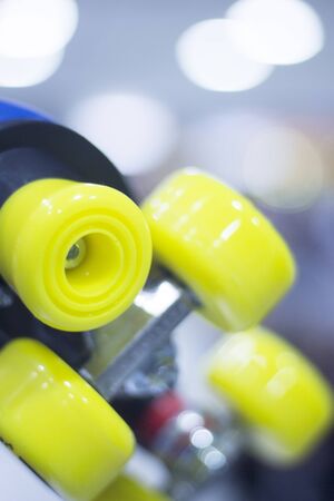 Childrens quad skate rollerskates in skate store in shop window display. Skates with four wheels and...