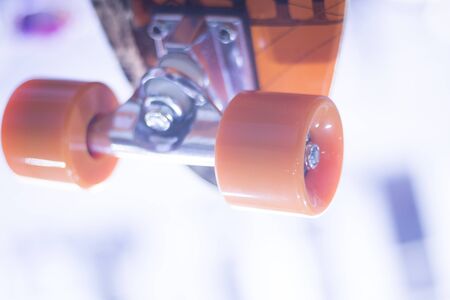 Skate board and wheels, axle and bearings in skates store on display in shop window on sale new and shiny.の写真素材