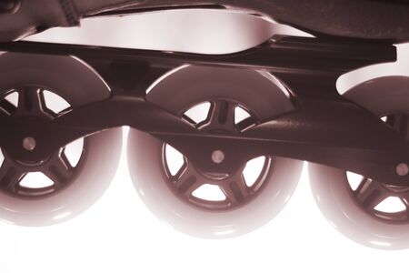 Freestyle inline skates boots and wheels in retail store shop window for free, urban, slalom, fitness and recreational skating.の写真素材