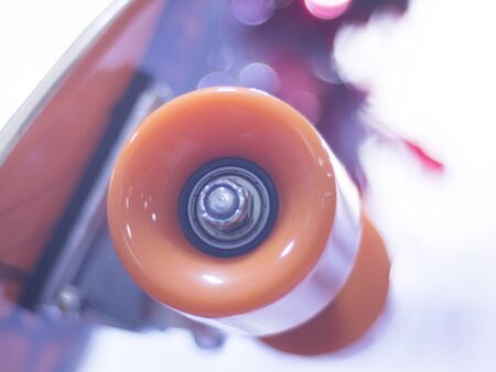 Skate board and wheels, axle and bearings in skates store on display in shop window on sale new and shiny.の写真素材