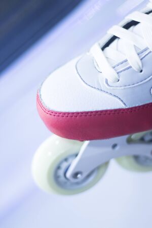Freestyle girls pink inline skates boots and wheels in retail store shop window for free, urban,...