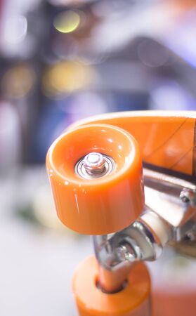 Skate board and wheels, axle and bearings in skates store on display in shop window on sale new and shiny.の写真素材