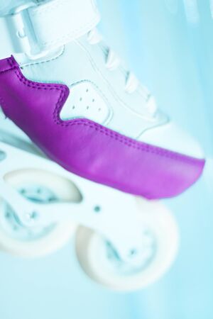 Freestyle girls pink inline skates boots and wheels in retail store shop window for free, urban,...