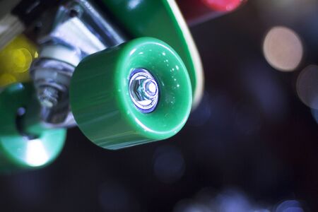 Skate board and wheels, axle and bearings in skates store on display in shop window on sale new and shiny.の写真素材