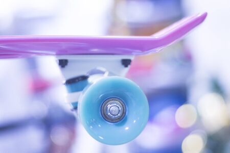 Skate board and wheels, axle and bearings in skates store on display in shop window on sale new and shiny.の写真素材
