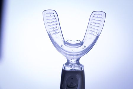 Teeth invisible brackets orthodontic dental tooth vibrator to accelerate orthodontics alignment straightening dentist treatment.の写真素材