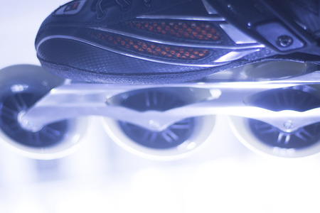 Freestyle inline skates boots and wheels in retail store shop window for free, urban, slalom,...