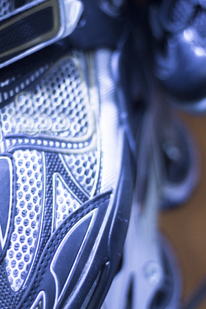 Freestyle inline skates boots and wheels in retail store shop window for free, urban, slalom, fitness and recreational skating.の写真素材