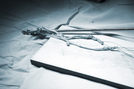 Knee tendon and ligament repair surgery in hospital operating theater emergency room for traumatology and orthopedics.の写真素材