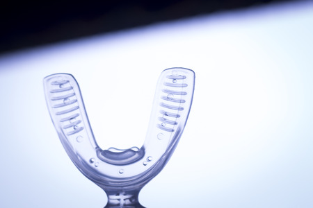 Teeth invisible brackets orthodontic dental tooth vibrator to accelerate orthodontics alignment straightening dentist treatment.の写真素材