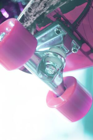 Skate board and wheels, axle and bearings in skates store on display in shop window on sale new and shiny.の写真素材