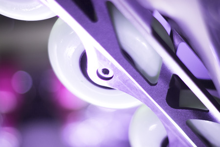 Freestyle inline skates boots and wheels in retail store shop window for free, urban, slalom, fitness and recreational skating.の写真素材