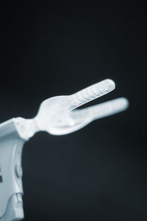Dental braces aligners accelerator for both modern invisible and metal brackets to straighten and align teeth.の写真素材