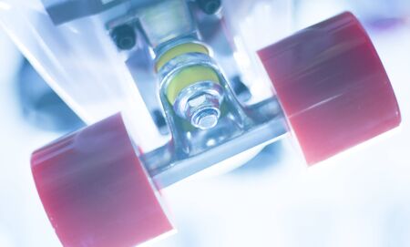 Skate board and wheels, axle and bearings in skates store on display in shop window on sale new and shiny.の写真素材