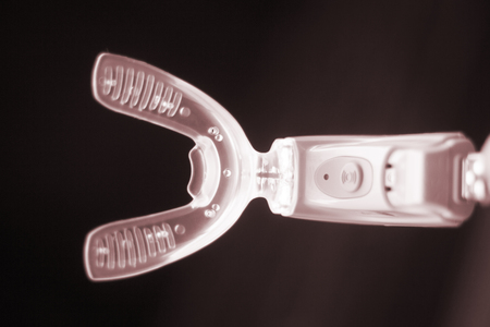 Dental braces aligners accelerator for both modern invisible and metal brackets to straighten and align teeth.の写真素材