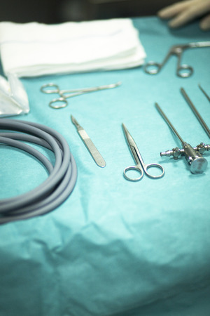 Surgery instrumentation in emergency room operating theater operation with instruments for the surgeon and knee procedure.の写真素材