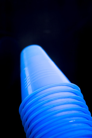 Sports marker plastic cones used for football, soccer, baseball, inline and roller skating slalom exercises and training.の写真素材