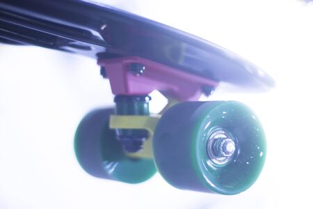 Skate board and wheels, axle and bearings in skates store on display in shop window on sale new and shiny.の写真素材