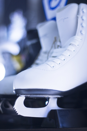 Ice skates in retail skate shop window display on sale.の写真素材