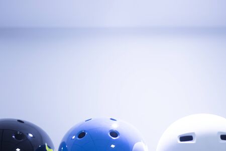 Inline and quad roller skates helmets head protection in retail skate shop display on sale.の写真素材