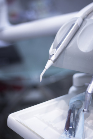 Dentists chair drill tools in dental office for drilling and fillings for patients.の写真素材