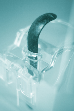 Dentist's office high technology modern dental xray machine in clinic to take x-rays of pateint teeth, mouth and jaw.の写真素材