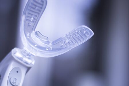 Dental braces aligners accelerator for both modern invisible and metal brackets to straighten and align teeth.の写真素材