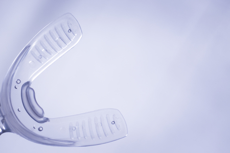 Teeth invisible brackets orthodontic dental tooth vibrator to accelerate orthodontics alignment straightening dentist treatment.の写真素材
