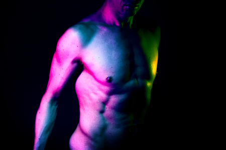 Sexy male nude slim athletic man with naked torso, chest and abs. Toned athletic physique with natural non steroid look.の写真素材