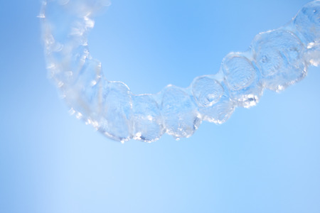Invisible retainers dental straightener and aligner brackets used to straighten and align teeth in...