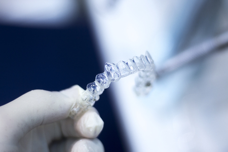 Invisible retainers dental straightener and aligner brackets used to straighten and align teeth in...