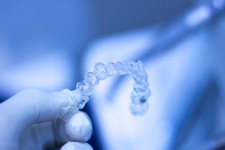Invisible retainers dental straightener and aligner brackets used to straighten and align teeth in...